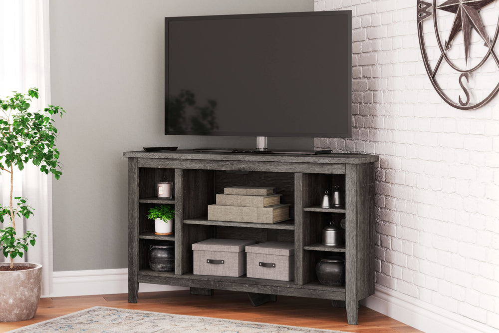 With its replicated weathered oak finish and authentic charm, this corner TV stand is right in tune with your relaxed approach to high style. Beautifully shaped to nestle into any corner, itâ€™s well equipped with adjustable and fixed shelving, a fireplac
