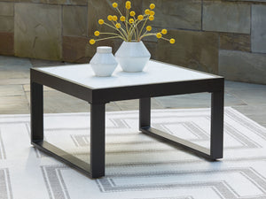  contemporary style meets outdoor living in this coffee table. Its clean-lined black aluminum frame expertly balances good looks and longevity. A stunning top provides the natural stone look you love