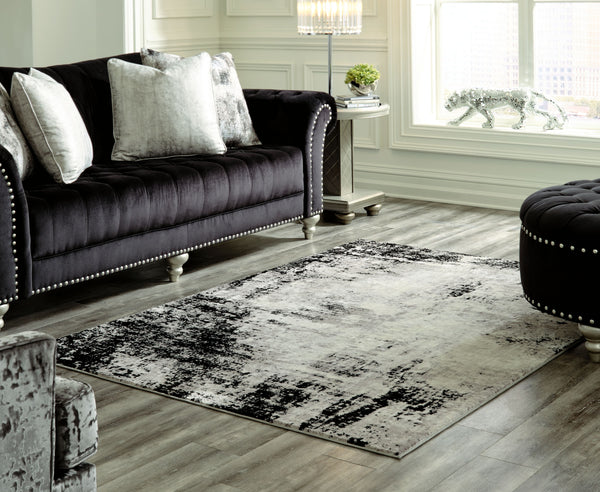  you-'re sure to be overjoyed with this area rug. Soothing shades of black