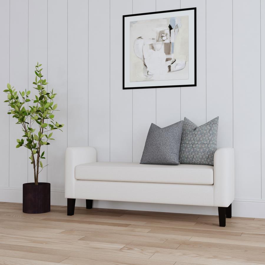 Finishing touches like a modern upholstered bench take your decor from good to great. This bench boasts a backless profile with arms the create a chic, cozy silhouette. The bench seat and frame are upholstered in soft vanilla fabric, creating a neutral pa