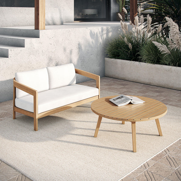 The Wesley 2-Piece Wood Patio Set, featuring a stylish outdoor loveseat with plush white cushions and a matching coffee table, offers the perfect combination of durability, comfort, and modern elegance for any outdoor space. Expertly crafted from FSC-Cert