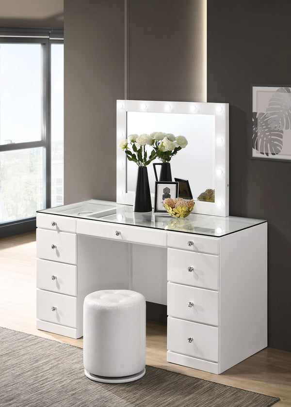 Step into a world of glamour with this sleek and chic vanity set, a perfect fusion of functionality and fashion. Its glossy white finish and clean lines are complemented by the sparkle of crystal-like knobs, adding a touch of sophistication to your person