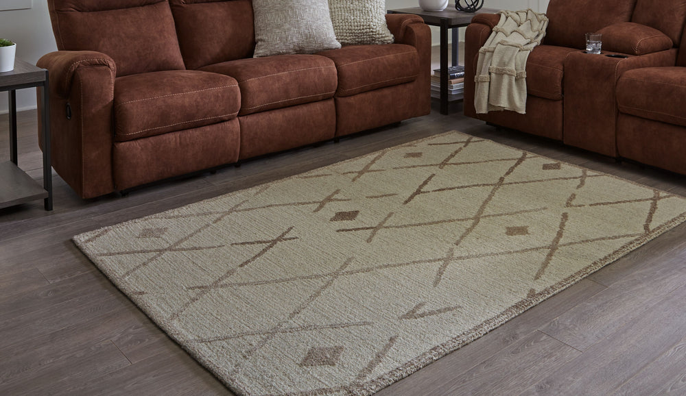 This elegant, understated area rug masterfully combines design and durability. Hand-tufted for superior quality, its geometric pattern and neutral palette pair seamlessly with rustic and contemporary decorative schemes. With a soft and cozy texture, this 