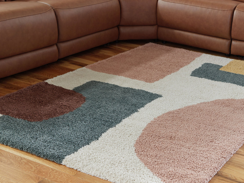 It feels awfully good to sink your toes into the high-pile plushness of this contemporary rug. With its eye-catching design, this floor centerpiece brings a sense of shag softness and geometric flair that sets your home apart.<br/><br/><b>Product Features