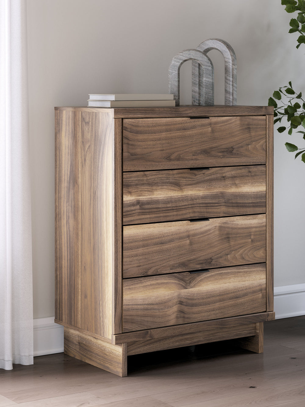 Nostalgic style, retooled for todayâ€™s trends. This chest of drawers puts an elevated twist on mod aesthetics. Its warm brown tones reflect the mid-century vibes you love, while the angular base incorporates contemporary motifs. Integrated drawer handles