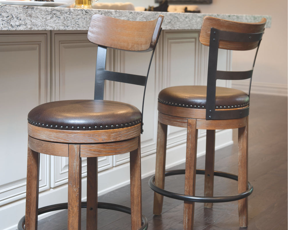 This striking counter height bar stool serves a sense of refinement without all the formality. A 360-degree spin element keeps you in the flow of conversation, while faux leather upholstered seating incorporates comfort and easy cleanup. The frameâ€™s sig