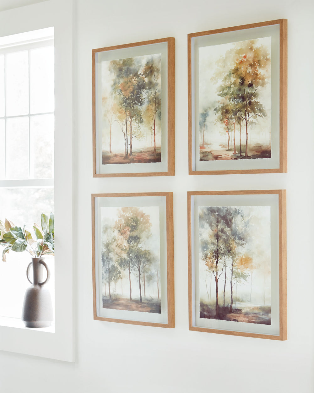 Embrace a new style with this wall art set. Featuring splendid renditions of countryside trees, these framed prints on glass add a touch of nature-'s beauty to your design scheme.<br/><br/><b>Product Features</b><ul><li>Set of 4</li><li>Framed print on gl