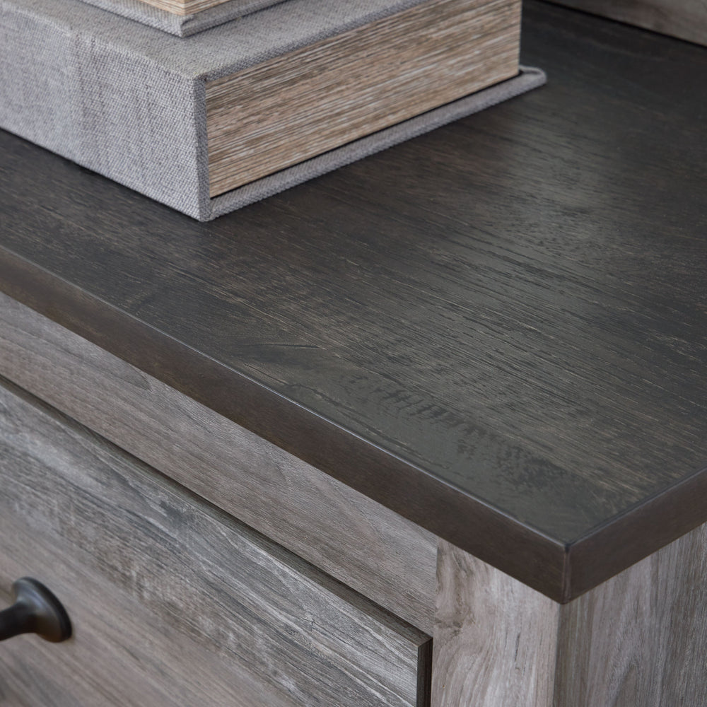 Alluring smoky gray hues create an ambiance that just feels right. This 6-drawer dresser and mirror set has a charming wood-like appeal enriched by a two-tone, textured look. Light neutral shades contrasted by a dark charcoal finish bring a refined yet re
