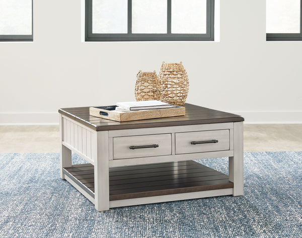  the planked look and clean two-tone finish lend a relaxing vintage feel. A clever lift-top section and spacious storage drawers double up on form an