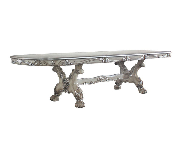 Acme is proud to present a new addition to our exclusive Dresden dining collection! This exquisite dining table in vintage bone white will look lovely in your home, with ornate carvings and raised floral motifs on its apron and trestle base. Two self-stor