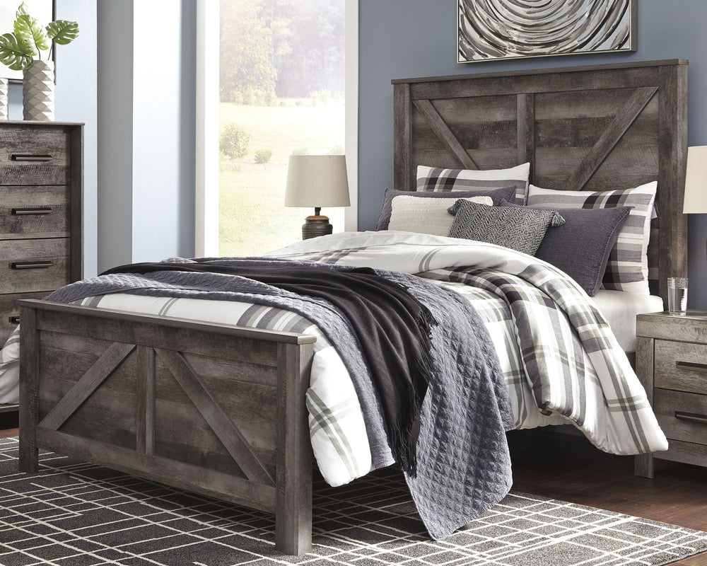Rustic gray planked replicated oak grain with authentic touch. Large scaled dark colored hooded pull. Sticks across headboard give a thick planked look. Side roller glides for smooth operating drawers. Cases feature a framed front and pilasters. Large dra