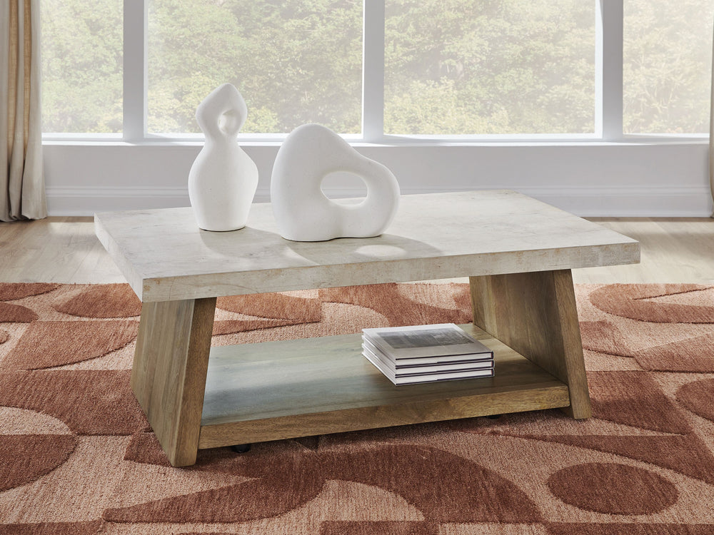 This coffee table captures the essence of todayâ€™s casual contemporary style. Its generous faux cement tabletop and double plinth base are a masterclass in modern design, while the spacious shelf is a casually cool spot for displaying decor. Casters let 