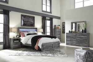 Baystorm - 6 pzs. - Cómoda, espejo, cama queen con paneles y 2 cajones de almacenamiento - Gris