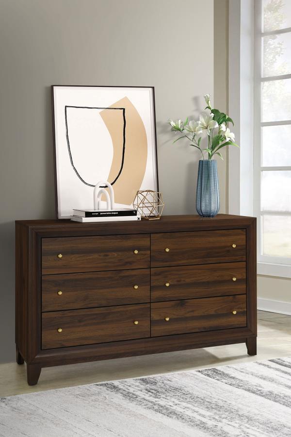 Create easy storage and organization in your bedroom with a modern six-drawer dresser. Its familiar silhouette provides a spacious top, perfect for decor or a jewelry box to add a personalized touch. The dresser boasts a rich walnut wood grain finish over
