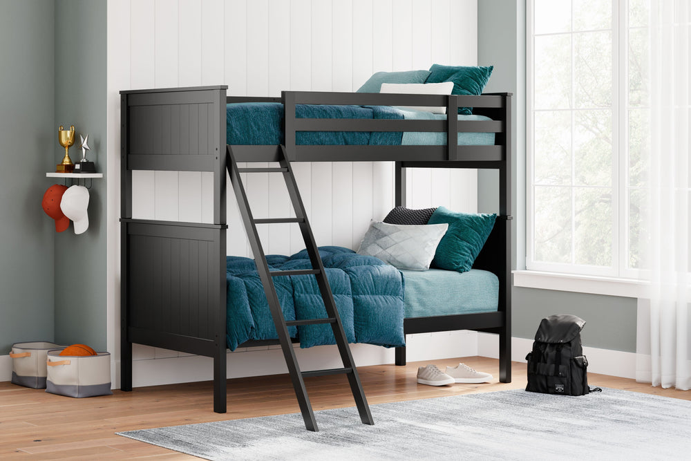 Maximize space and turn your kids-' bedtime into an adventure with this cool twin-over-twin bunk bed. It-'s an effortless addition to any bedroom, with a timeless Shaker style that-'s wonderfully finished in black. Guard rails on the top bunk help everyon
