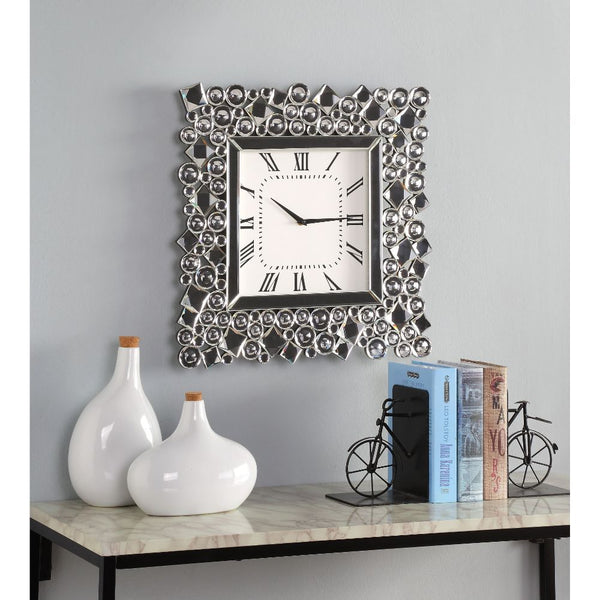  this eye-catching Kachina wall clock keeps your eye on the hour with chic style. The faux gem inlay adorned frame with mirrored panels add a dash of glamour. Lean into this piece-'s traditional influence by adding it t