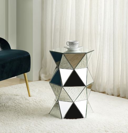 Balance your room decor with this glitzy modern work. Unique design brings modern glamour to your room areas. This beautiful mirrored pedestal features a attractive polygon base, adding depth and dimension to your room design. It-'s multi-layered look can