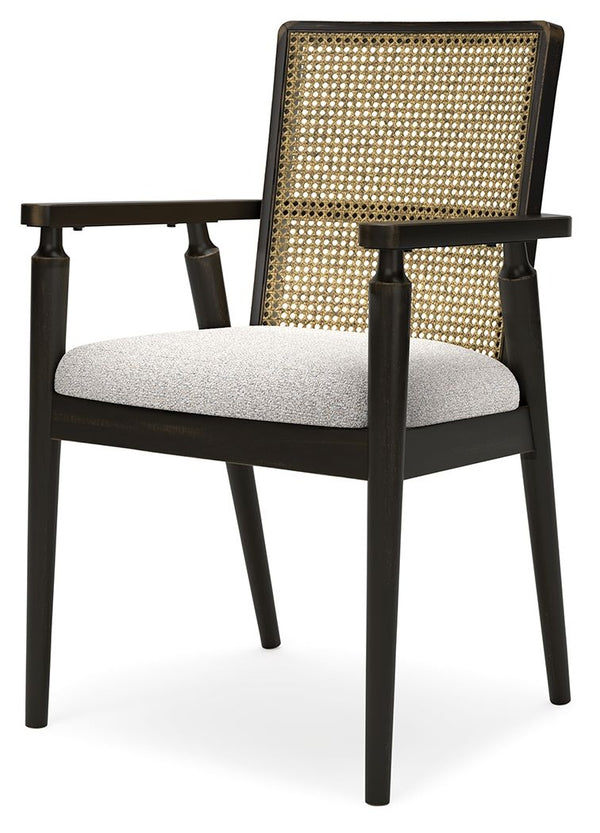 This dining arm chair brings a rustic vibe to urban contemporary design. Itâ€™s a modern approach to natural beauty