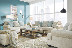  turn to this designer chair and ottoman. Wind down at the end of a long day when you sink into this canyon of comfort. <h4><b>Monaghan - Sandstone - Chair and a Half</b></h4> <table width=-"100%-"><colgroup><col style=-"wid