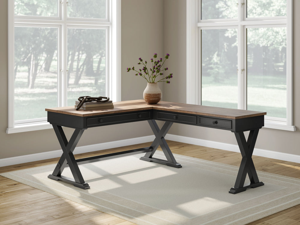 Raise the bar on modern farmhouse style with this home office desk and return. Its casual good looks are accentuated with a two-tone finish, which pairs a warm satin black base with a contrasting butcher block veneer desktop. The drop-down keyboard and tw