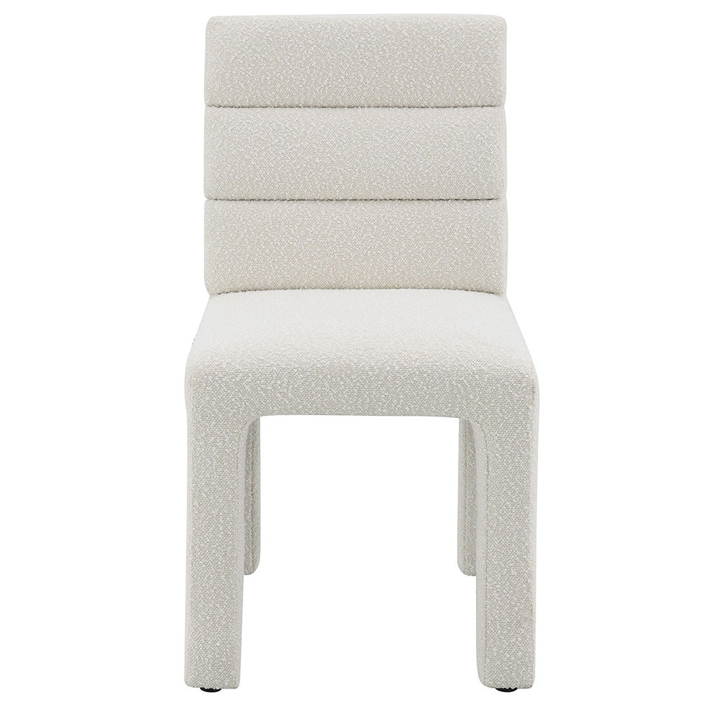 Hettie collection side chair enveloped in luxurious beige boucle, exudes timeless elegance and comfort. Its structured design and plush upholstery make it an ideal addition to any dining or living space. This chair not only provides a chic seating option 