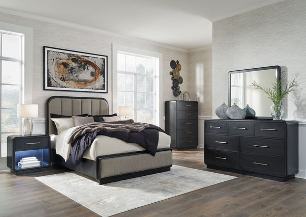 Inspired by art deco design, this softly shaped bedroom package makes a lasting impression in a simply stunning way. Contemporary lifestyle design. Made with hardwood solids and ash veneer. Rich layered black finish on textured wood grain surface. Collect