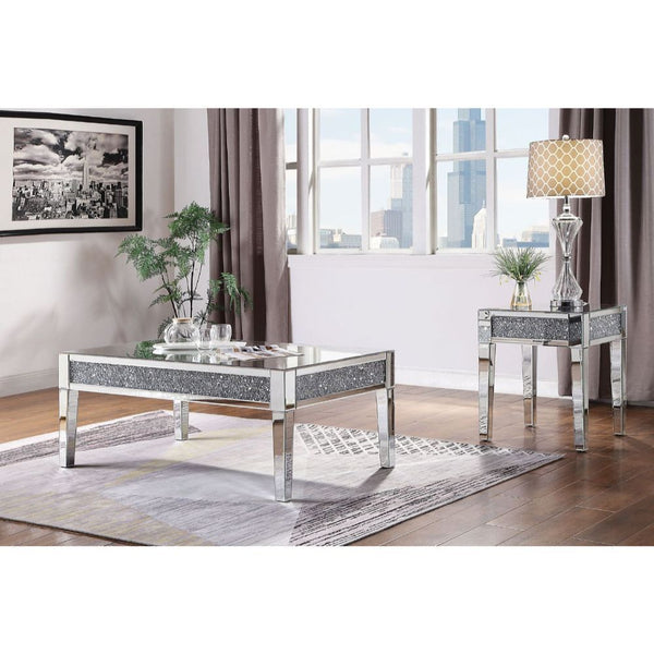  this brilliant rectangular occasional table showcases a distinctive style for an intriguing look. The table features a fully mirrored beveled frame with