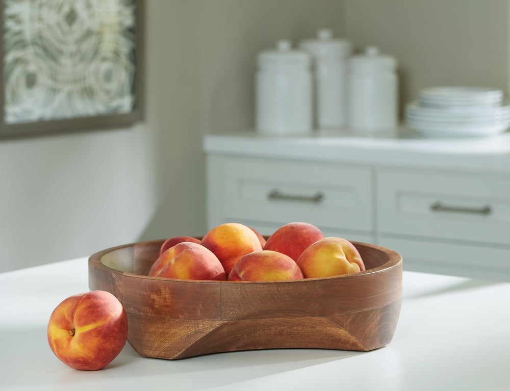 Wow with the beauty of wood. This bowl brings natural appeal to your countertop or cabinets. Make it a chic spot to store produce, or use it to serve sides during dinner. It also makes a stunning catch-all spot in your entryway for keys, wallets and every