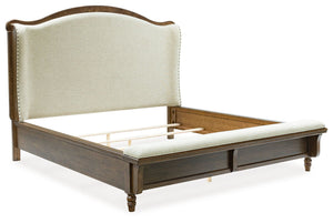 Traditional style doesnâ€™t have to be stuffy. It can feel warm, inviting and beautifully in the moment. Case in point: this queen upholstered panel bed. The alluring piece features a distinctive headboard with a shelter wing design. Its cushioned bench f