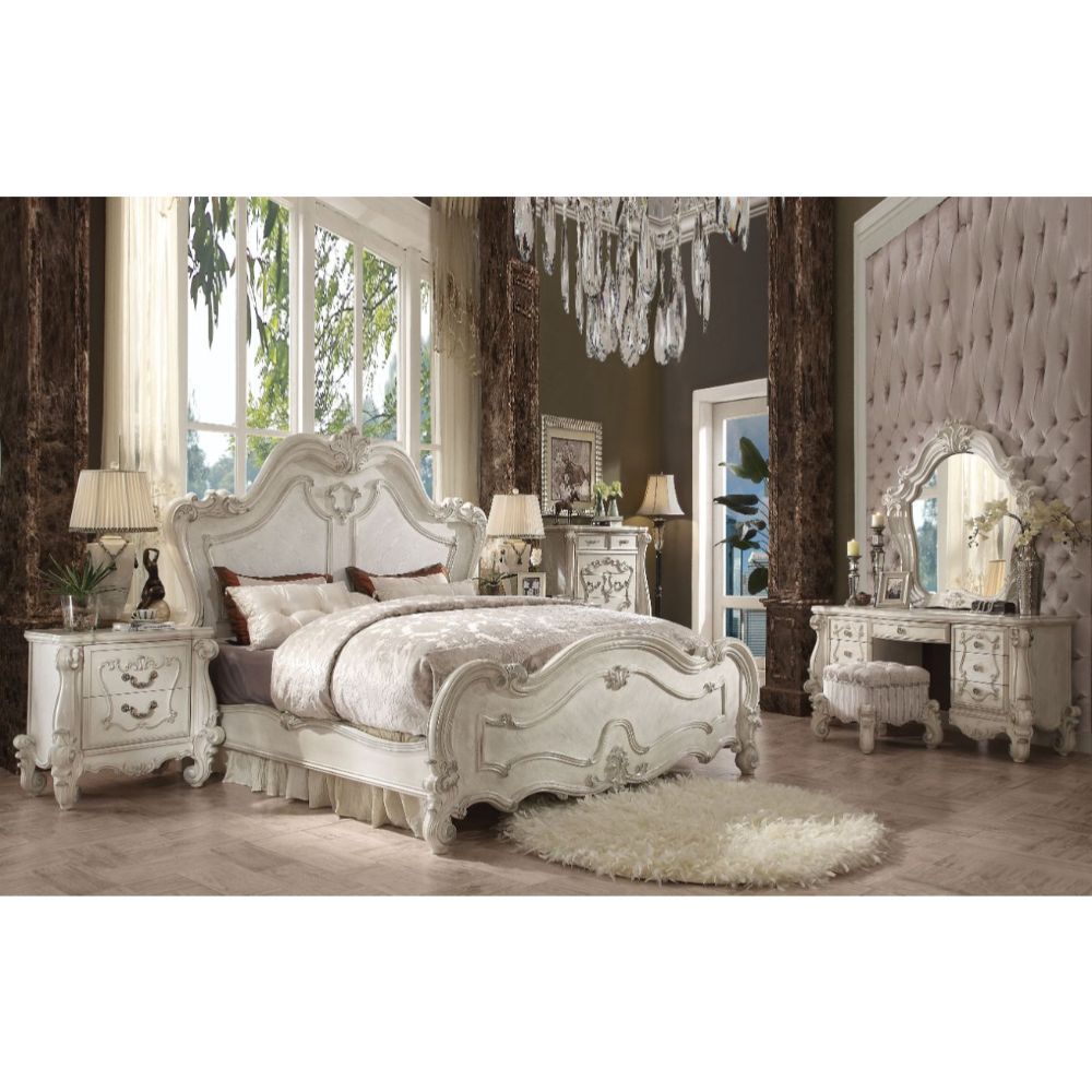 Sleeping like royalty with this Versailles, the bedroom set was inspired by old European design. This collection features carved scrollwork accent on headboard. The accent pieces crafted in wood with bone white finish and also included regal features such