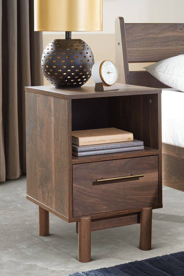 paired with a burnished goldtone handle