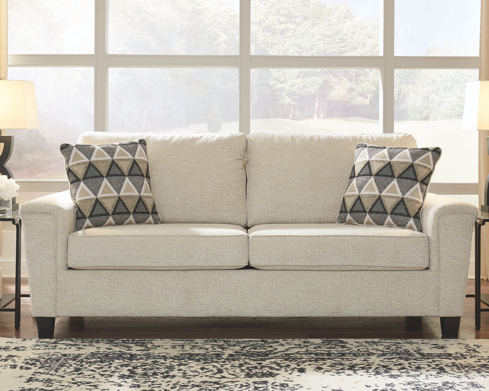 Everyone can have the best seat in the house with this sofa and loveseat. An indulgent choice with deep seats crafted for cloud-like softness, this set is the ideal merger of modern flair and classic staying power. <h4><b>Abinger - Natural - Sofa</b></h4>