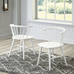  white finish. The dining room chair sports a low spindle back with turned legs for beautiful simplicity. This functional piece marries minimalism with big style for a delightful combination.<b