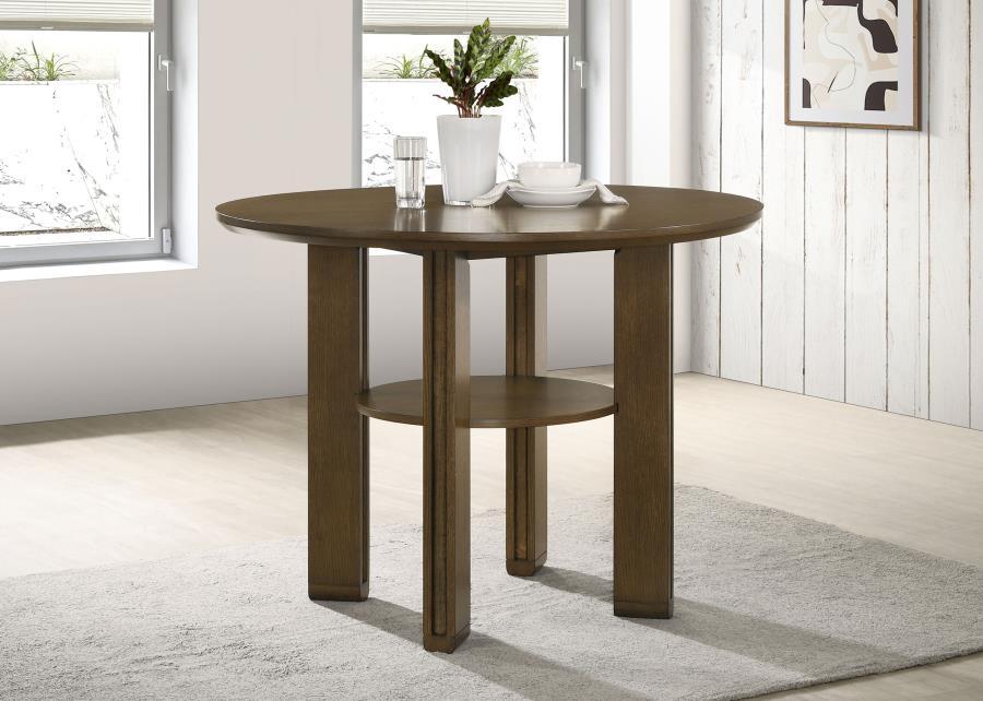 This counter-height dining table brings transitional elegance to casual dining spaces. Crafted from white oak veneer, Asian hardwood, and engineered wood, it features a rich brown finish that adds warmth and sophistication. The table-'s angular legs provi