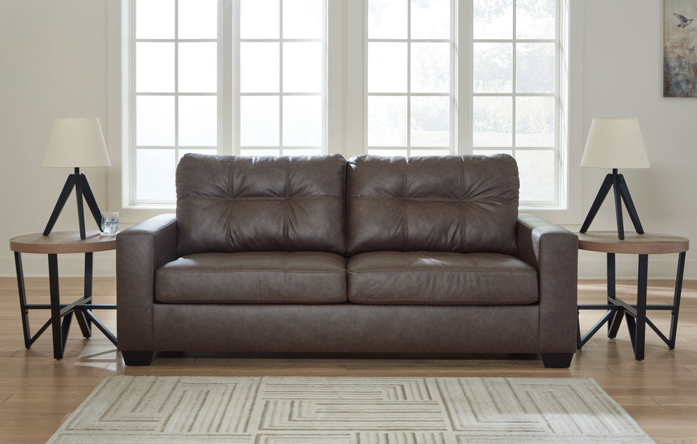 Everyday comfort meets versatile style in this sofa with matching loveseat and recliner. The handsome hue of the goes-with-anything faux leather takes away the stress of styling, expertly pairing with your existing aesthetic. From kicking back on the week