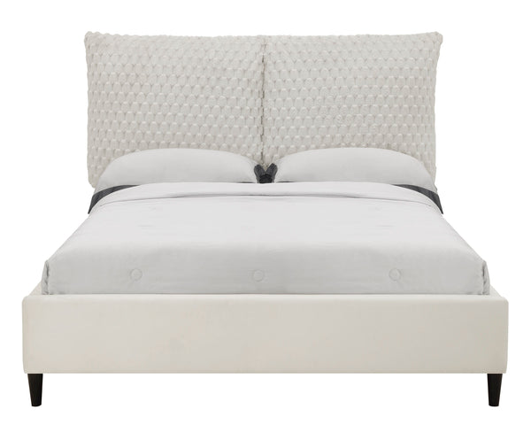 This luxurious bed is the centerpiece of a serene and sophisticated bedroom oasis. It features an opulent, tufted headboard that rises high to make a grand statement, upholstered in a sumptuous fabric that invites a touch of elegance and comfort. The bed-