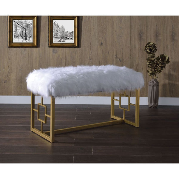 Exude an air of sophistication and comfort with this Bagley II bench. Featuring white faux fur seat cushion and gold metal base, this armless lounge bench is destined to be your favorite piece. Regardless where you placed it, it will always be the attenti