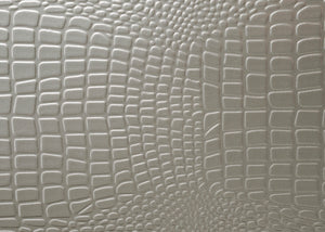  making a bold statement with its textured surfaces and elegant champagne finish. Th