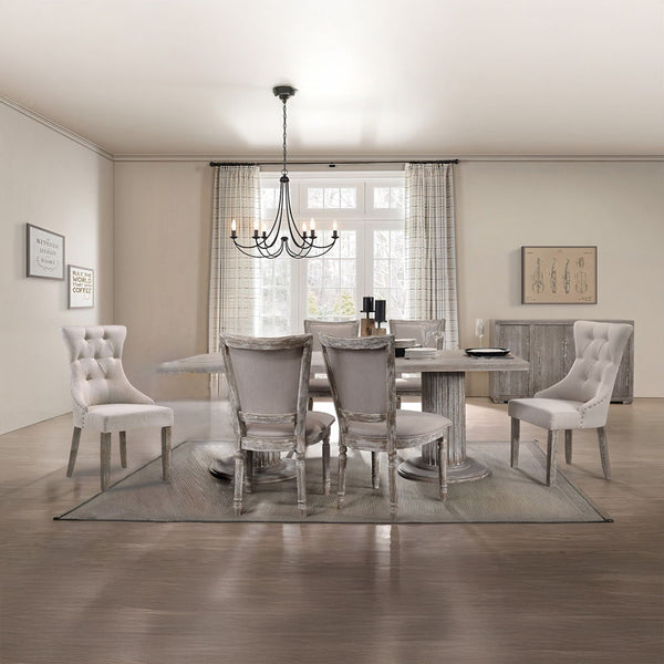  the Gabrian dining collection and its beautifully artistic accents will transform a conventional room into a luxurious dining space. The table features a spectacular double pedestal base with fluted column design typ