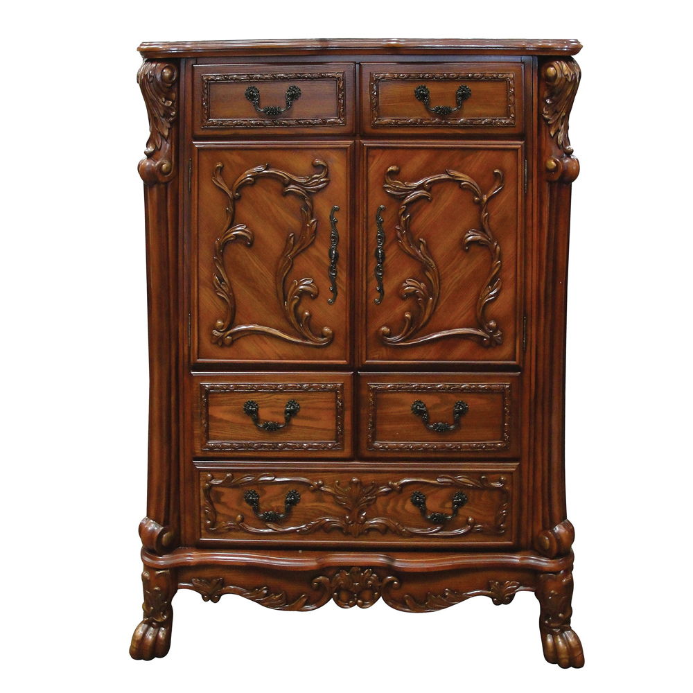 The Dresden Chest is crafted with the finest solid woods with veneers in cherry oak finish. Dresden Collection is enhanced by remarkable marquetry and generously carved wood elements. The case goods feature solid hardwood with five drawers and two door wi