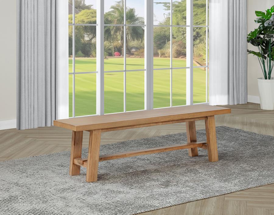 This 60-inch dining bench blends natural character with lasting durability. Crafted from solid mahogany, engineered wood, and ash veneer, it offers sturdy seating and subtle warmth. A versatile alternative to traditional chairs, it comfortably accommodate