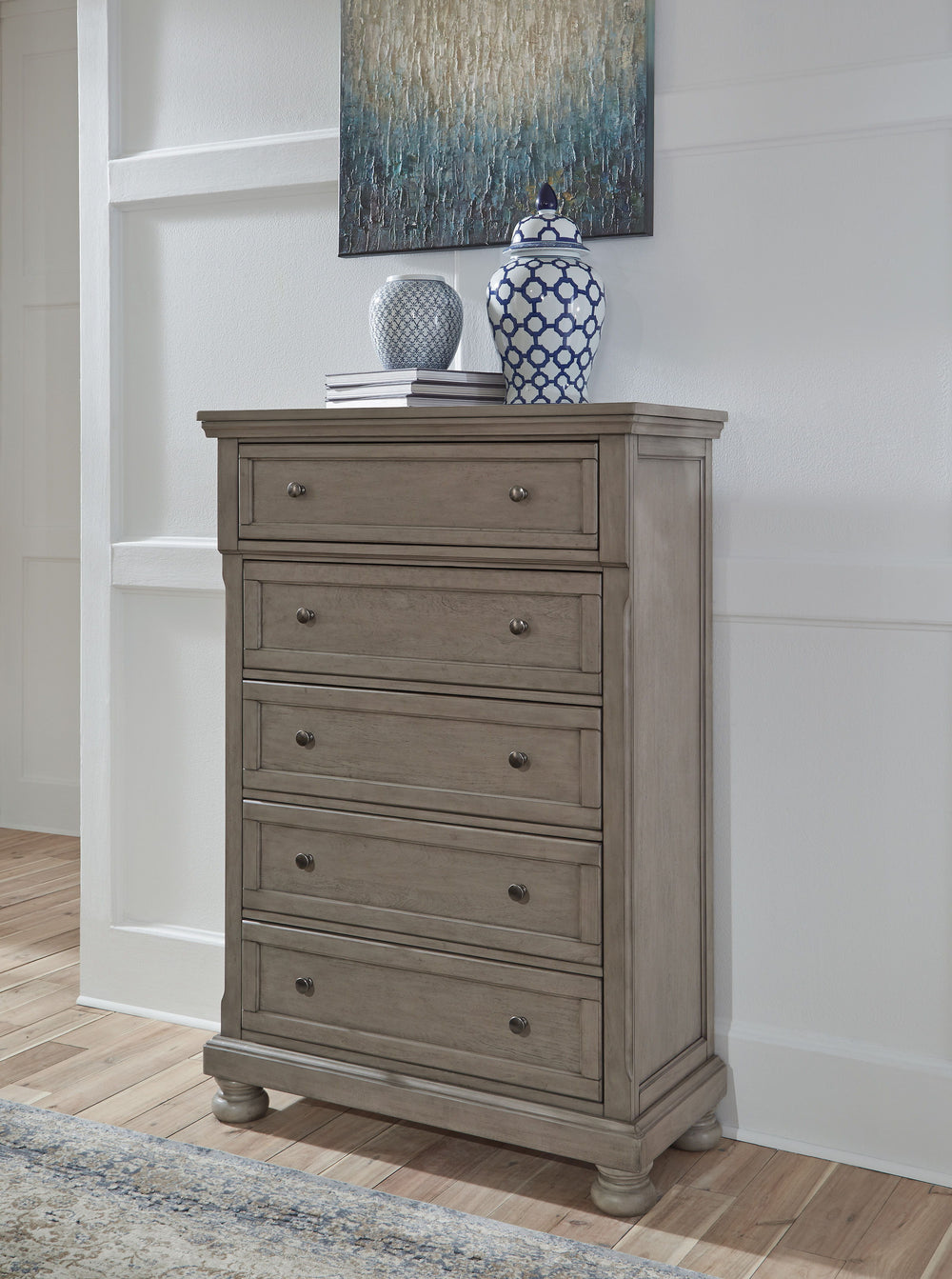 Made with select Birch veneers and hardwood solids. Burnished light gray finish. Drawers feature a silver-tone patina color knob and back plate. Dovetail drawer construction. Drawer interior with color finish. Ball bearing drawer glide. Felt drawer bottom