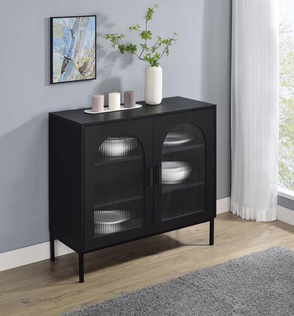  elegantly shaped with subtle arches and showcasing framed fluted tempered glass doors. Inside