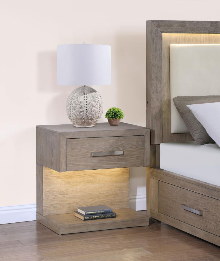 Enhance your stylish bedside with a modern one-drawer nightstand with a built-in LED light. The night table creates a light, airy ambiance with the combination of its open silhouette and accent lighting. It sets an inviting ambiance for relaxation and lou