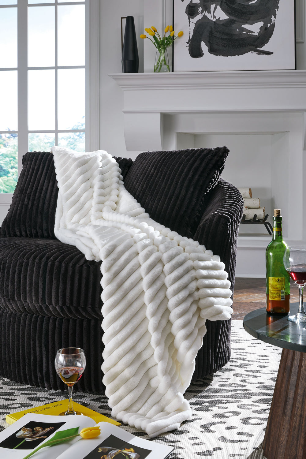 As cozy as they come, this faux fur throw turns your seating area into a haven of comfort. Its neutral hue acts as the perfect foundation for layering, whether mixed with pillows or draped over the arm of a sofa. And itâ€™s machine washable, so you can sp