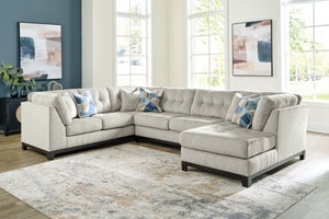  on-trend style meets functionality in this sectional with chaise. Details like tufted cushions and a wrap-around accent base reflect your urban contemporary tastes while staying versatile as your style changes. And with its soft upholstery