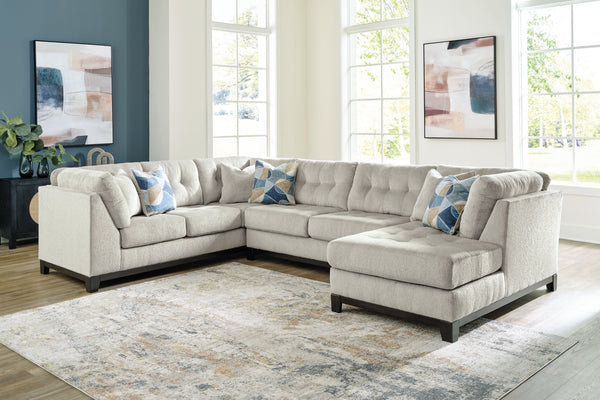  on-trend style meets functionality in this sectional with chaise. Details like tufted cushions and a wrap-around accent base reflect your urban contemporary tastes while staying versatile as your style changes. And with its soft upholstery