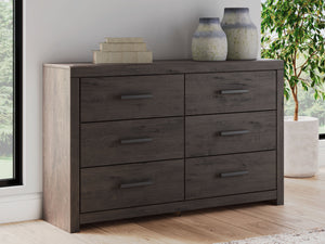  this dresser is a simply chic approach to modern living. A dark charcoal finish blends black and brown undertones