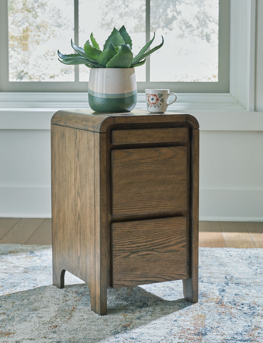 In the market for furniture that combines contemporary form with smart functionality? Look no further than this accent table. Its drawers keep essentials within reach, while the pull-out tray easily holds nibbles and drinks. And its USB charging options m