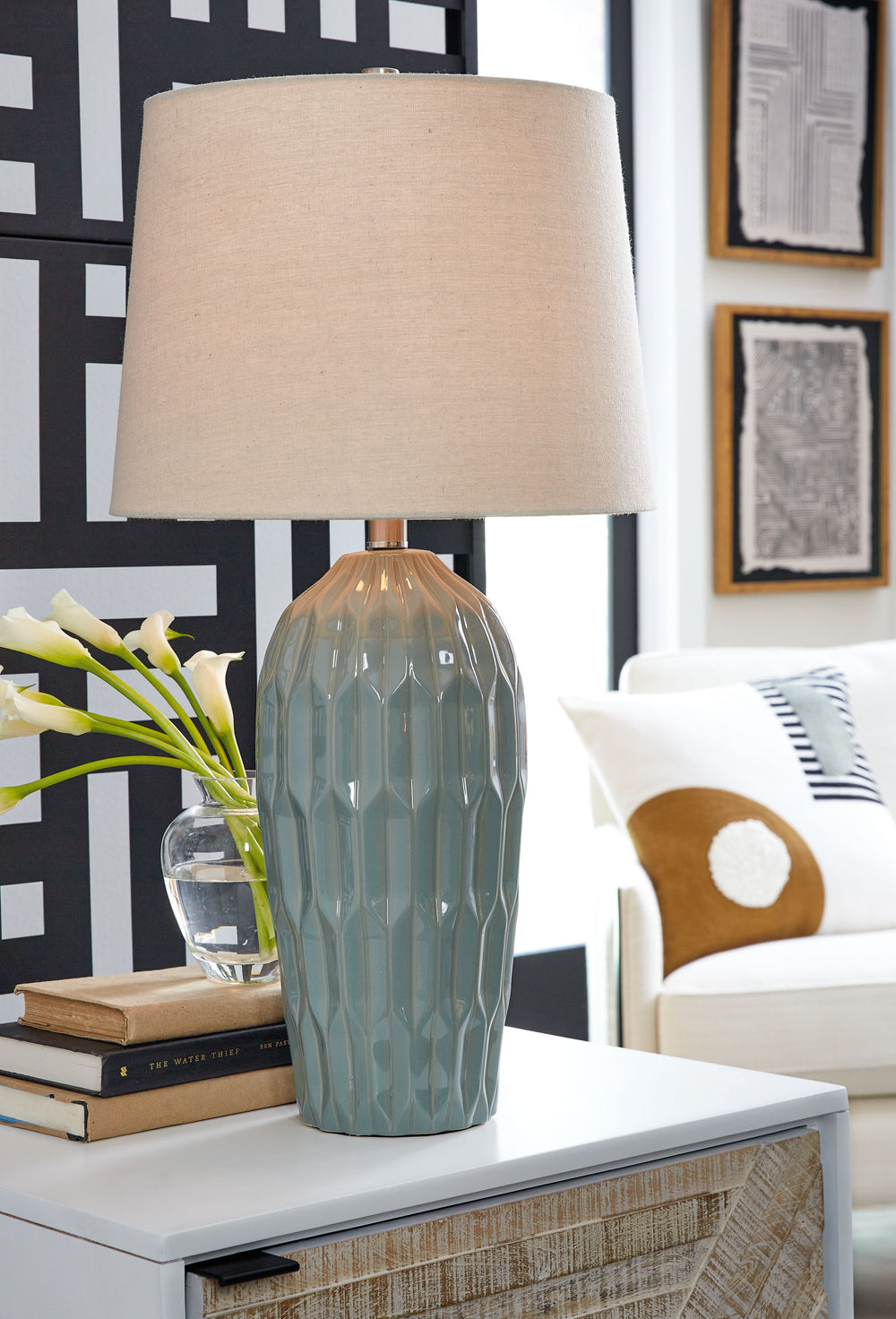 Contemporary with a retro vibe, this table lamp is hard to miss. A dimensional design on the ceramic base shines a bright light on sophisticated style in the bedroom, entryway or your favorite spot.<br><br><b>Additional Dimensions</b><br><ul><li>Shade: 0-